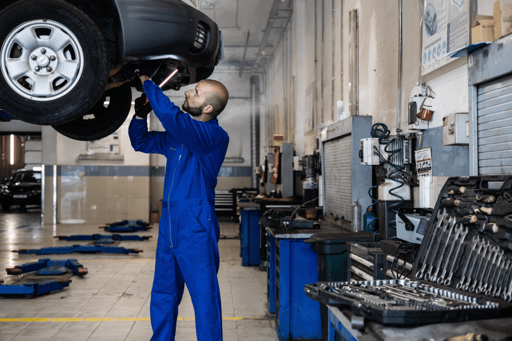 Mechanic working on a car